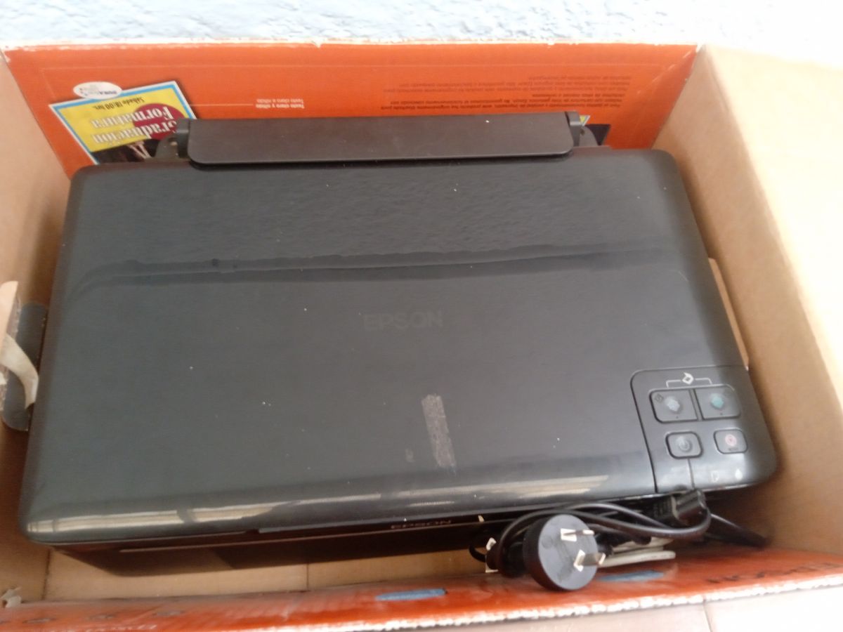 Impresora Epson Tx 125 con escáner para repuestos o reparar