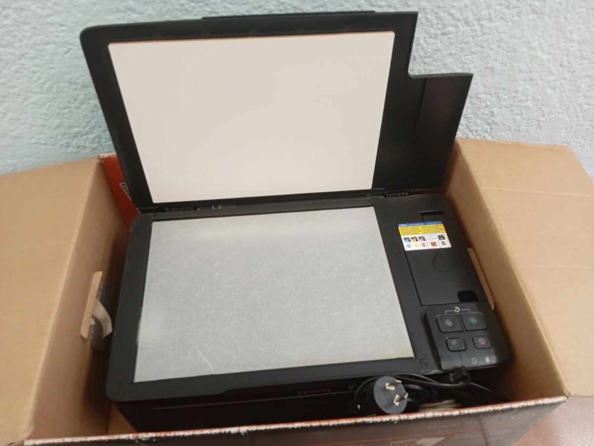 Impresora Epson Tx 125 con escáner para repuestos o reparar