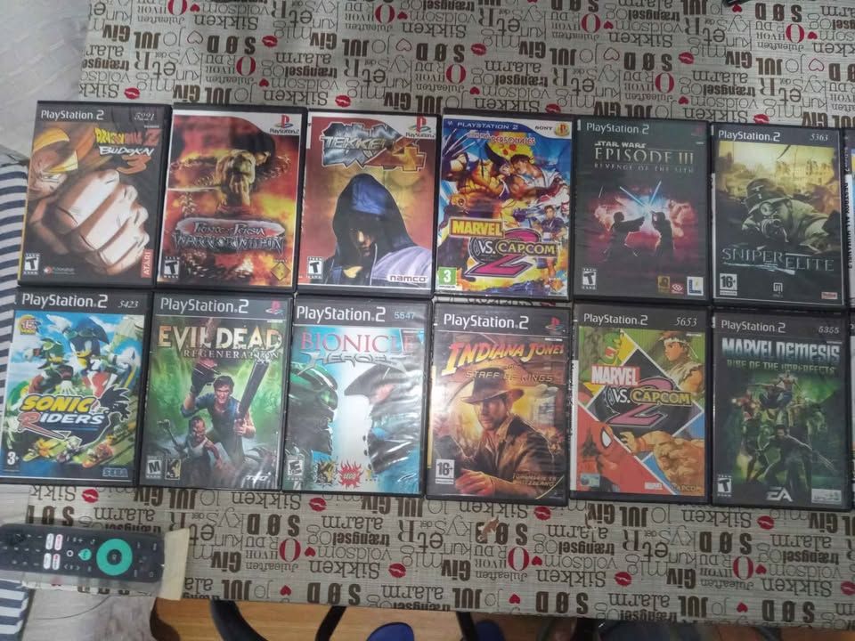 Ps2 Slim completa + joystick + 20 juegos