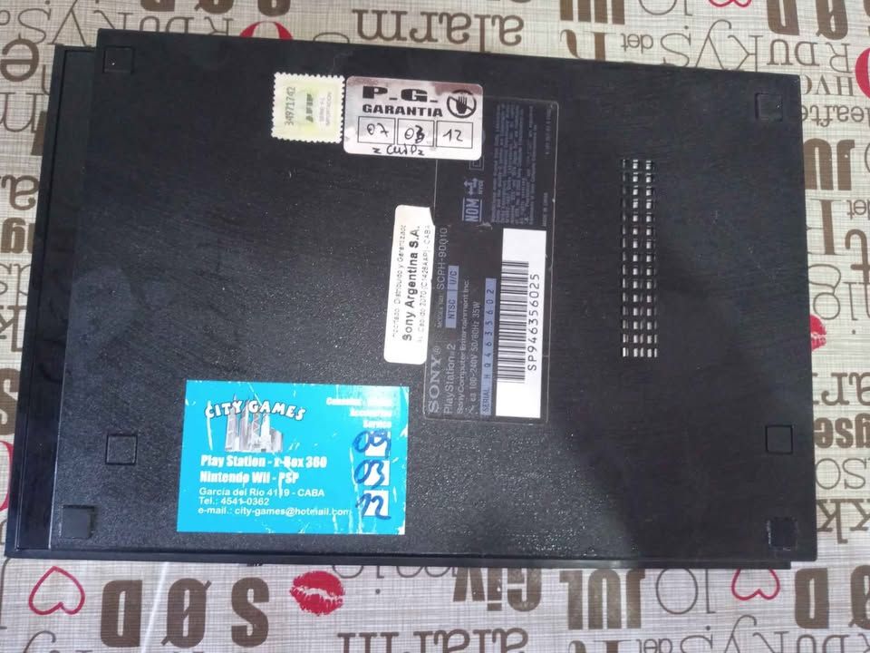 Ps2 Slim completa + joystick + 20 juegos