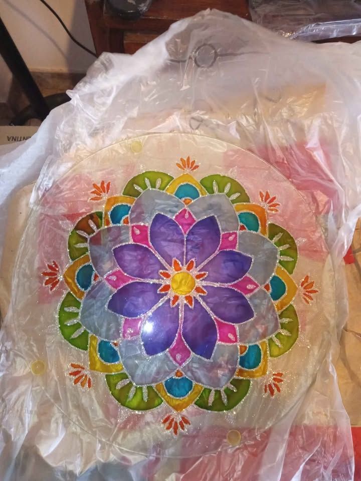 Individuales de vidrio decorado.