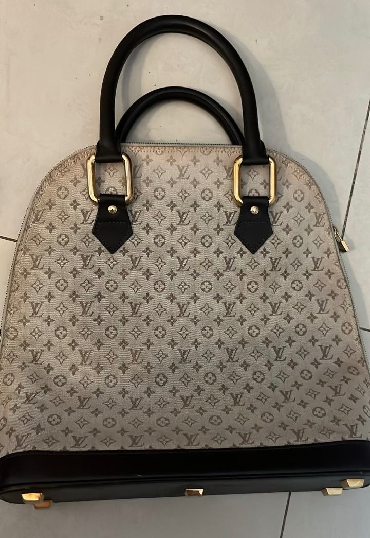 Bolso Louis Vuitton Mini Lin Alma Haut y Portacosmeticos